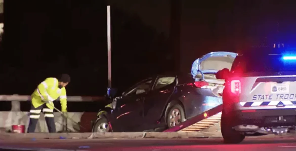 Virginia State Police cruiser near a highway crash scene in Alexandria after an I-395 pursuit