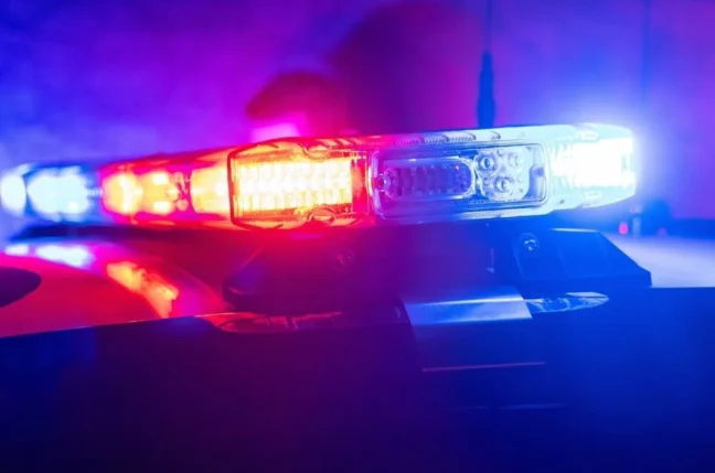 Police cruiser near Loch Raven Boulevard in Towson after an armed carjacking investigation