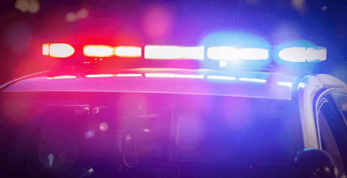 Police vehicles respond to a residence during a standoff on Silver Street in Marion, Ohio