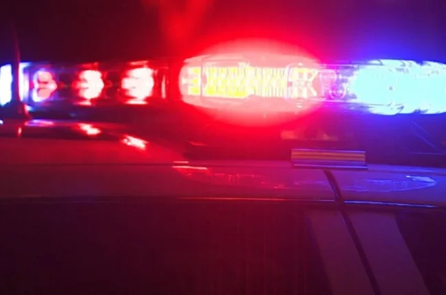 Police lights at a crash scene in Merrill after a multi-county chase