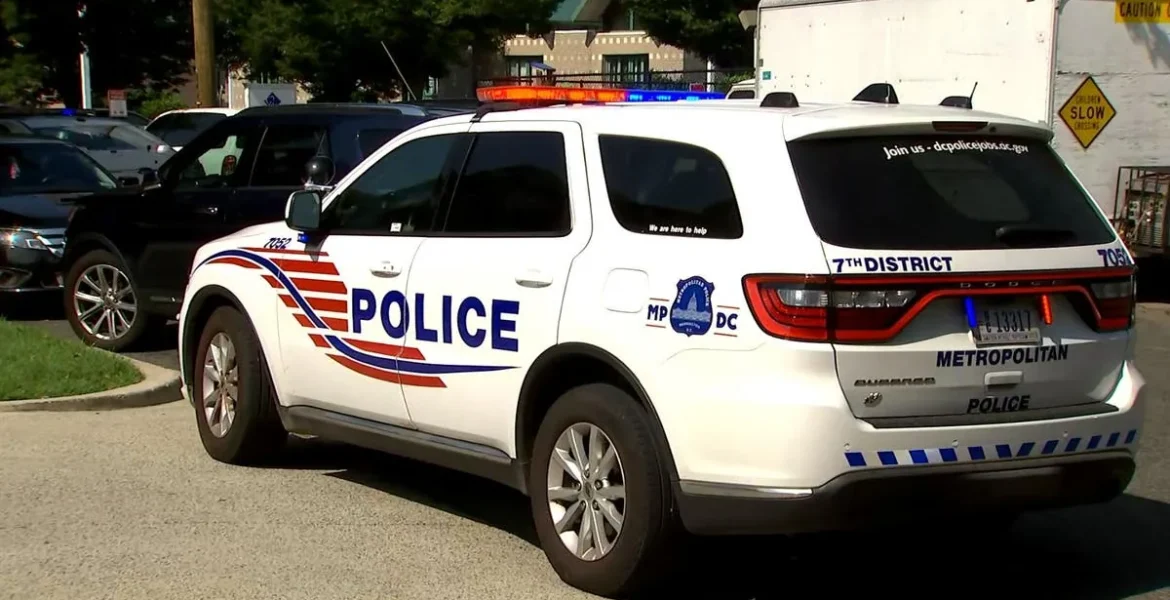 Police tape near an apartment building in Northwest Washington after a shooting investigation