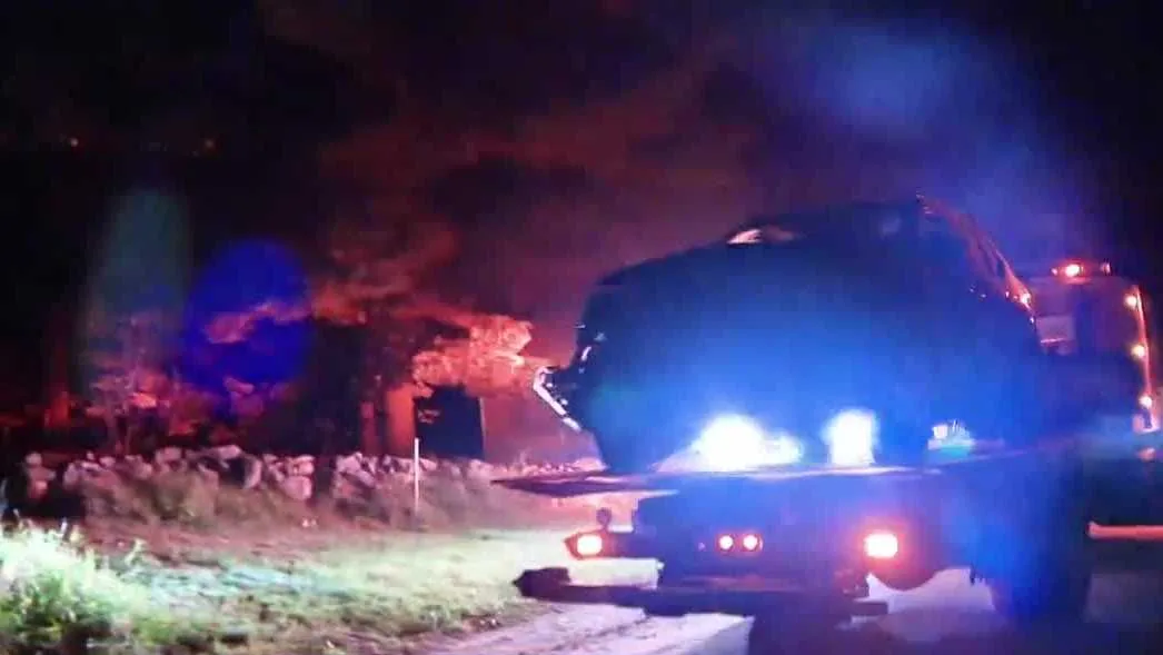 Police cruiser damaged after a head-on crash on a road in Antrim, New Hampshire